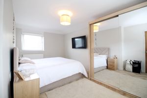 Bedroom One- click for photo gallery